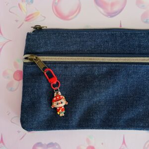 small carol singer christmas keychain